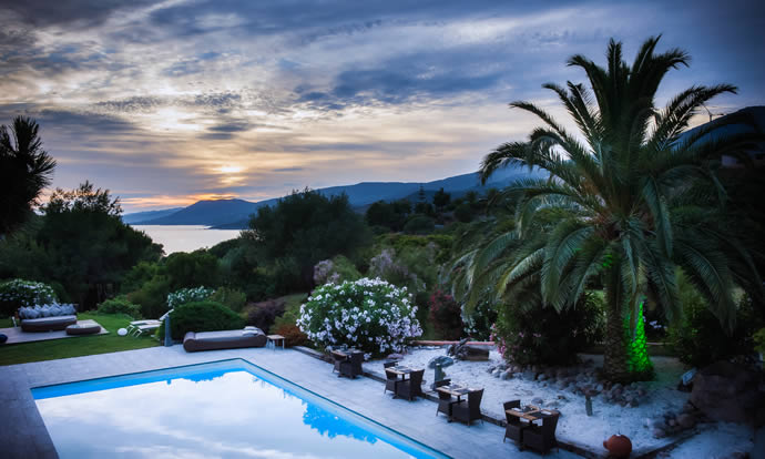 The view across the pool from a stylish Corsican hotel